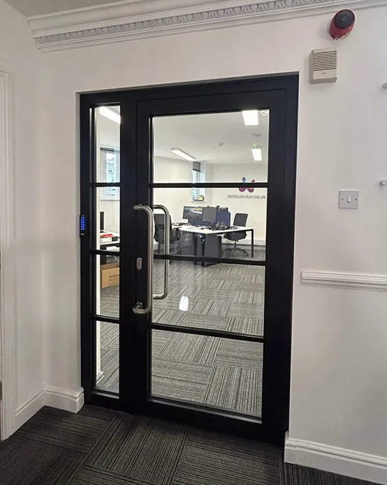 Photograph of internal fire rated doors. EI30 Fire Rated Door. Featured image for our article on 'can fire rated doors have windows?'